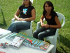  Giusi e Valentina accolgono gli ospiti allo stand di Giù le Mani dai Bambini, al Castello di Osasco
