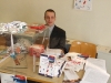  Il nostro volontario milanese, Daniele Bargnesi, gestisce un desk informativo in occasione di un seminario a Milano